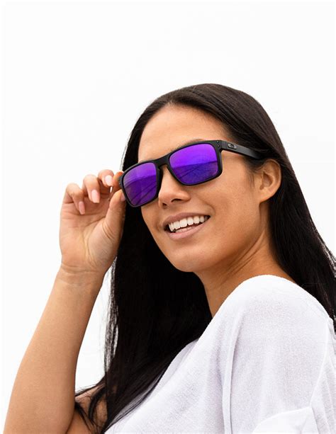 black sunglasses with purple lenses.